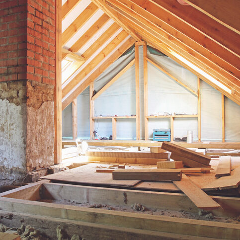 an interior view of a house attic under construction