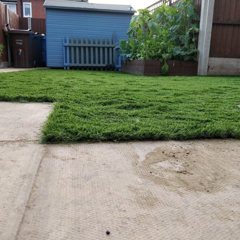 Artificial grass installation in Hindley by Wolsten, North West