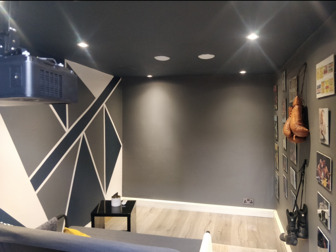 Finished home cinema -- feature wall, ambient lighting