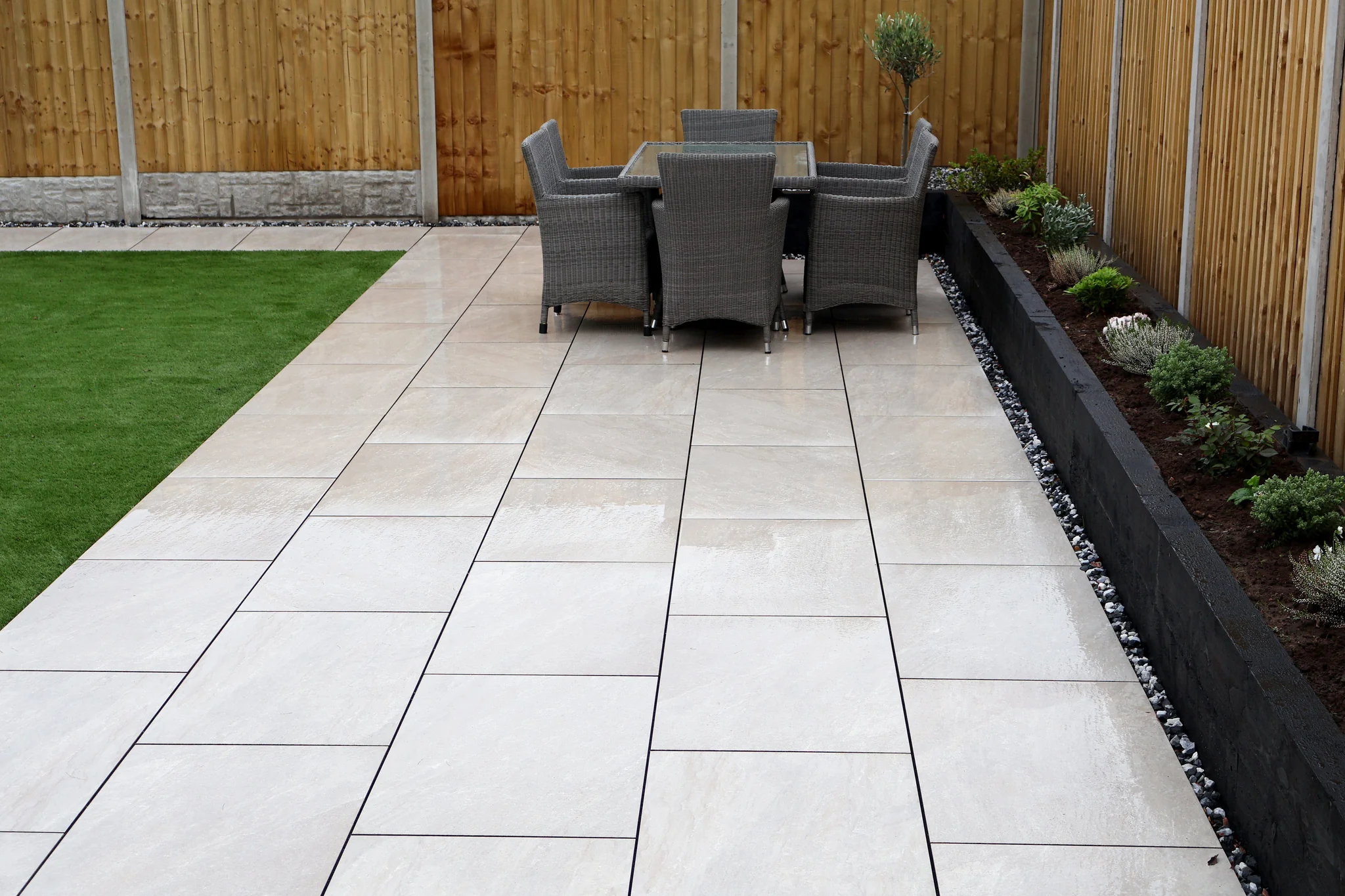 Beige porcelain slab patio installed by Wolsten in Bolton