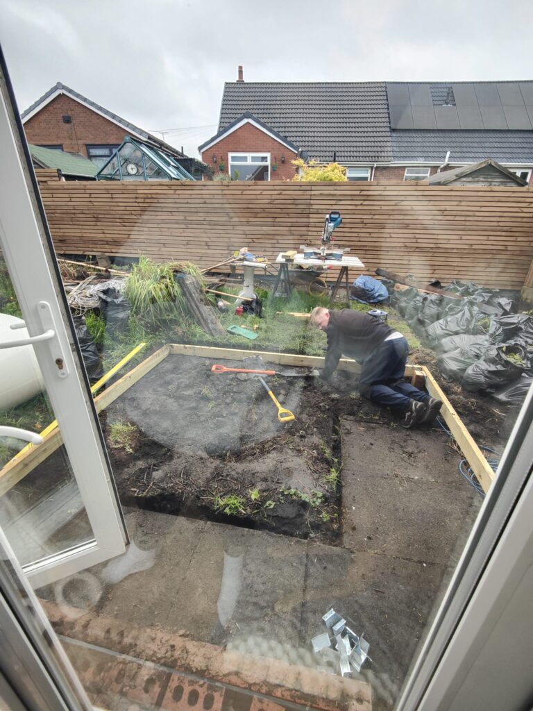 Ground and surface preparation for composite decking sub-frame in Bolton