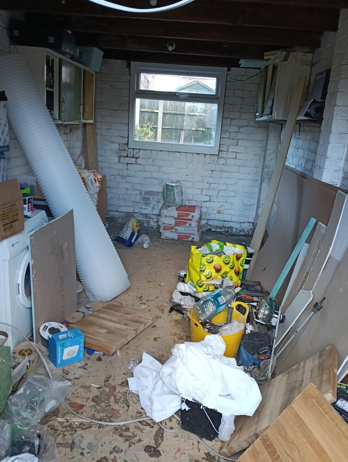 Over Hulton garage interior before conversion