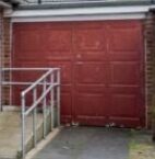 Over Hulton garage exterior before conversion -- up-and-over garage door, Bolton