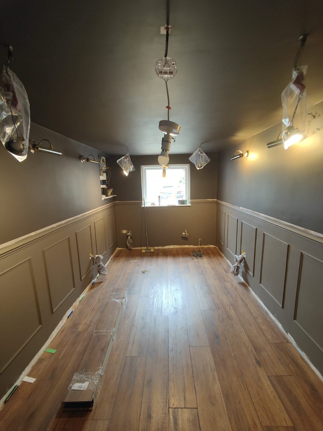 Finished Over Hulton home office with mahogany media wall