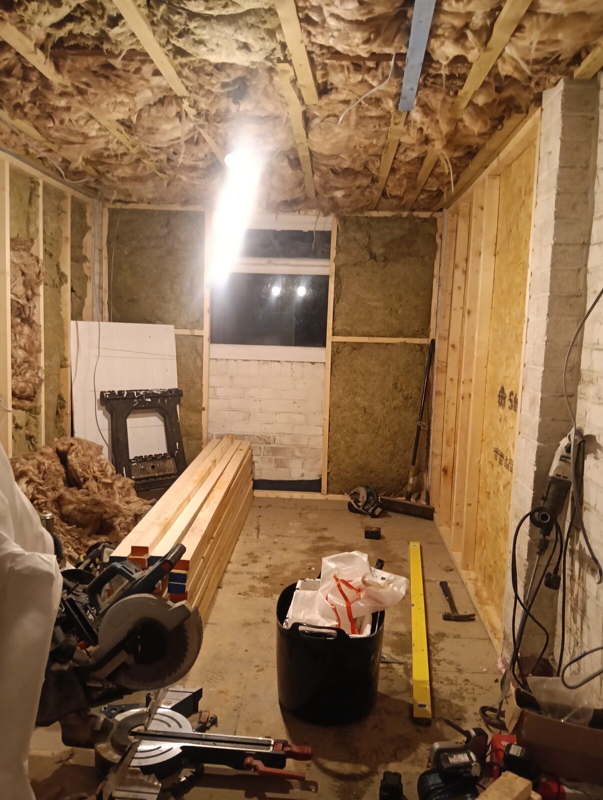 Over Hulton garage insulation and studwork