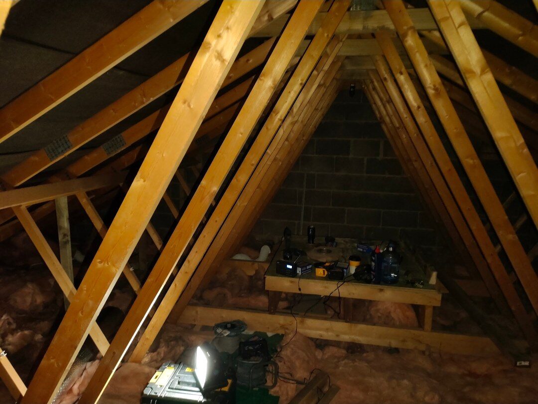 Bolton loft before conversion -- bare roof trusses