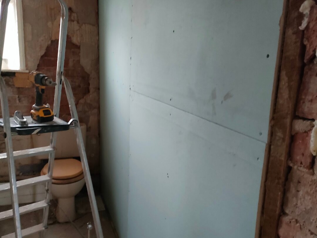 Bathroom Installation in Bolton — bare walls preparation