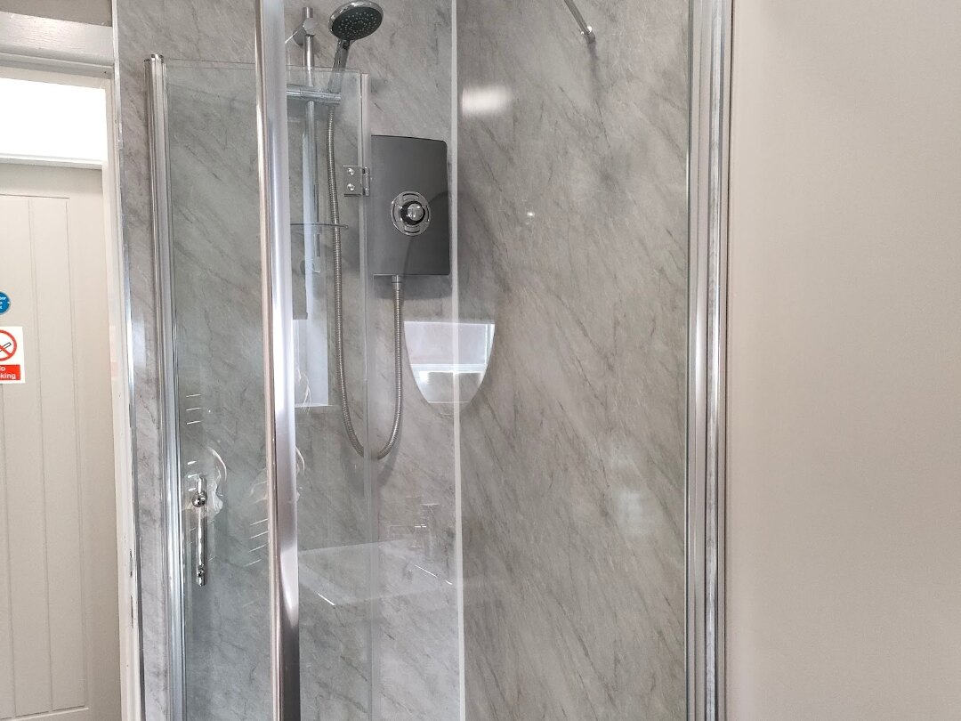 Bathroom Installation in Bolton — tiled shower enclosure