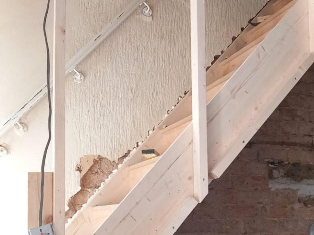 Staircase Replacement in Bolton — landing stud framing